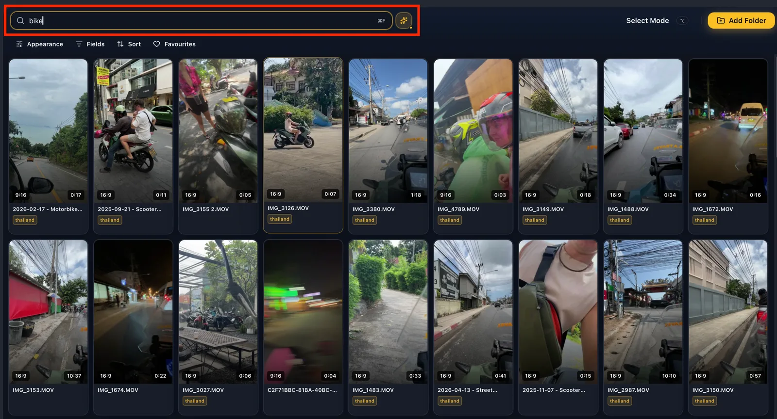 The VidFinder grid after a plain-language search, showing a row of matching thumbnails with one mid-scrub under the cursor